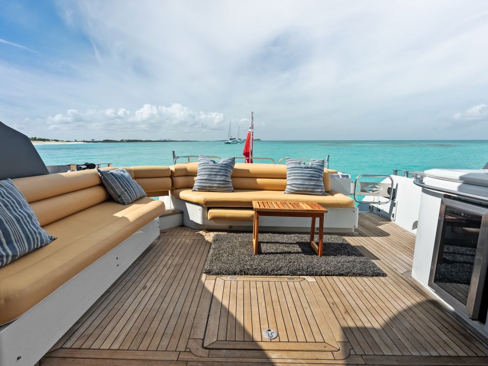 Teak aft deck with lounge seating and sea views